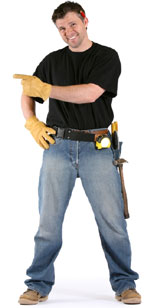 Handyman in work gloves and a black shirt, pointing and smiling, with tools visible on his belt, illustrating the importance of usability and practical solutions in digital marketing.