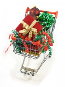 Shopping for christmas goodies Holiday shopping cart filled with decorative gifts, bows, and ornaments, symbolizing festive eCommerce strategies for increased customer engagement.