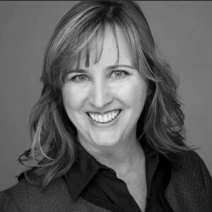 Jeanne Jennings smiling in a professional headshot, emphasizing expertise in email marketing strategies for holiday campaigns.
